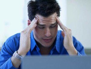 Man Massaging Temples